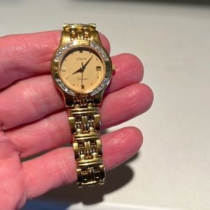 Gold plated watch with diamonds